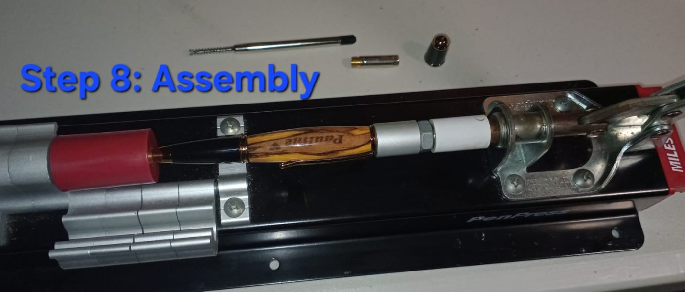 Press & assemble — the pen being pressed together on a pen press jig